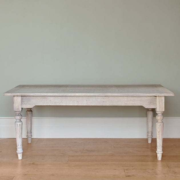 Gustavian dining table seen side on, showing its carved turned leg