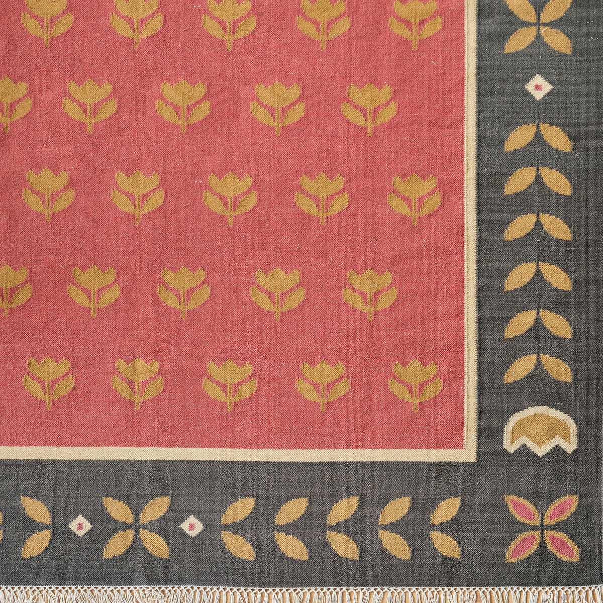 Red Gold Tulip kilim close up, gold tulips with a charcoal border