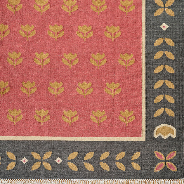 Red Gold Tulip kilim close up, gold tulips with a charcoal border