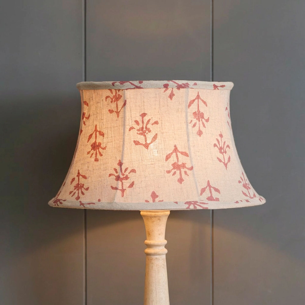 Indian Red Moonflower lampshade in a larger size on a turned base