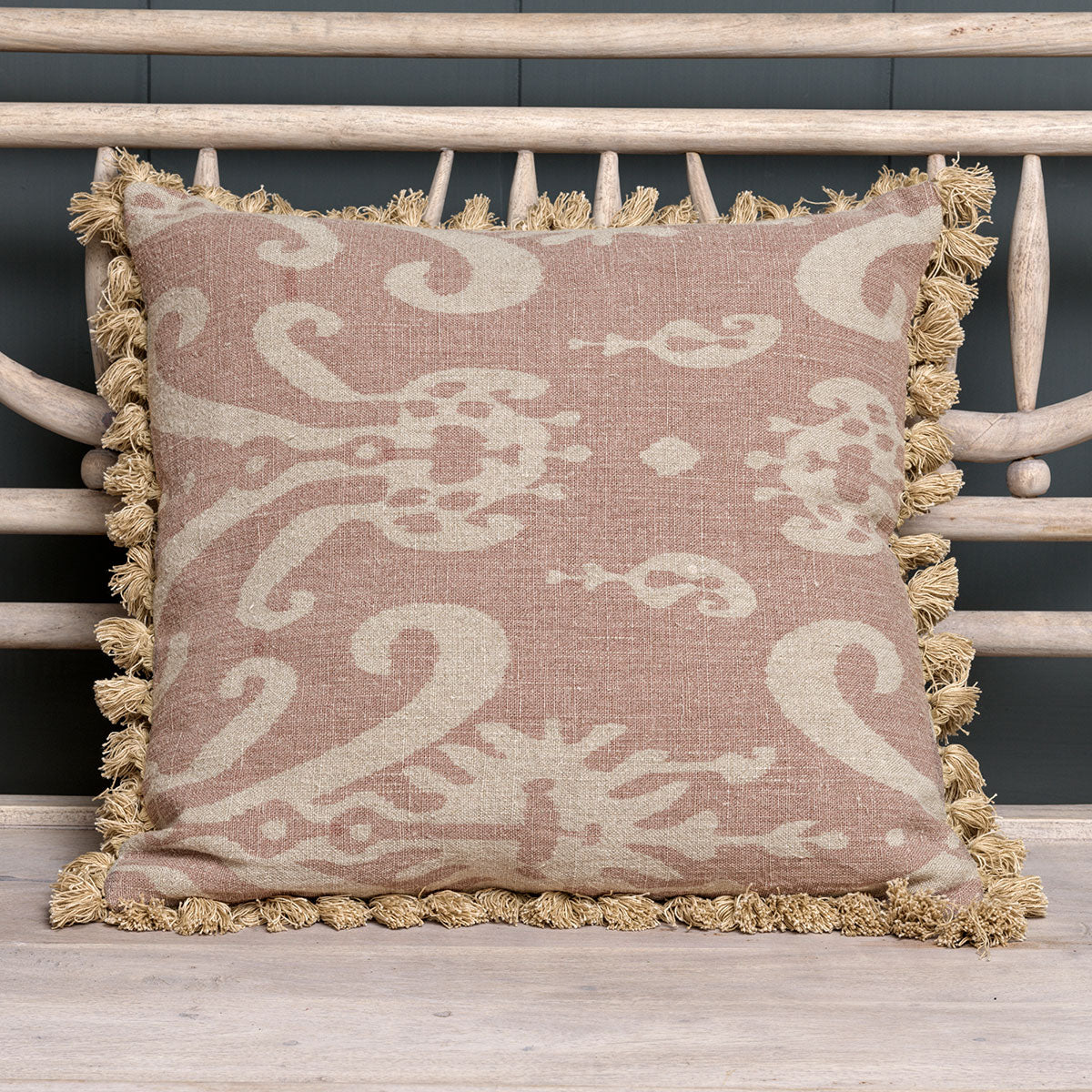 Dusky Pink Sacha rustic linen cushion with ikat print and tassel trim