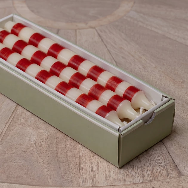 Boxed set of red and white striped hand-painted dinner candles