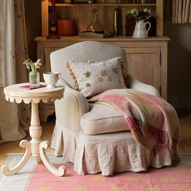 Embroidered Summer Garland cushion on Rustic Linen
