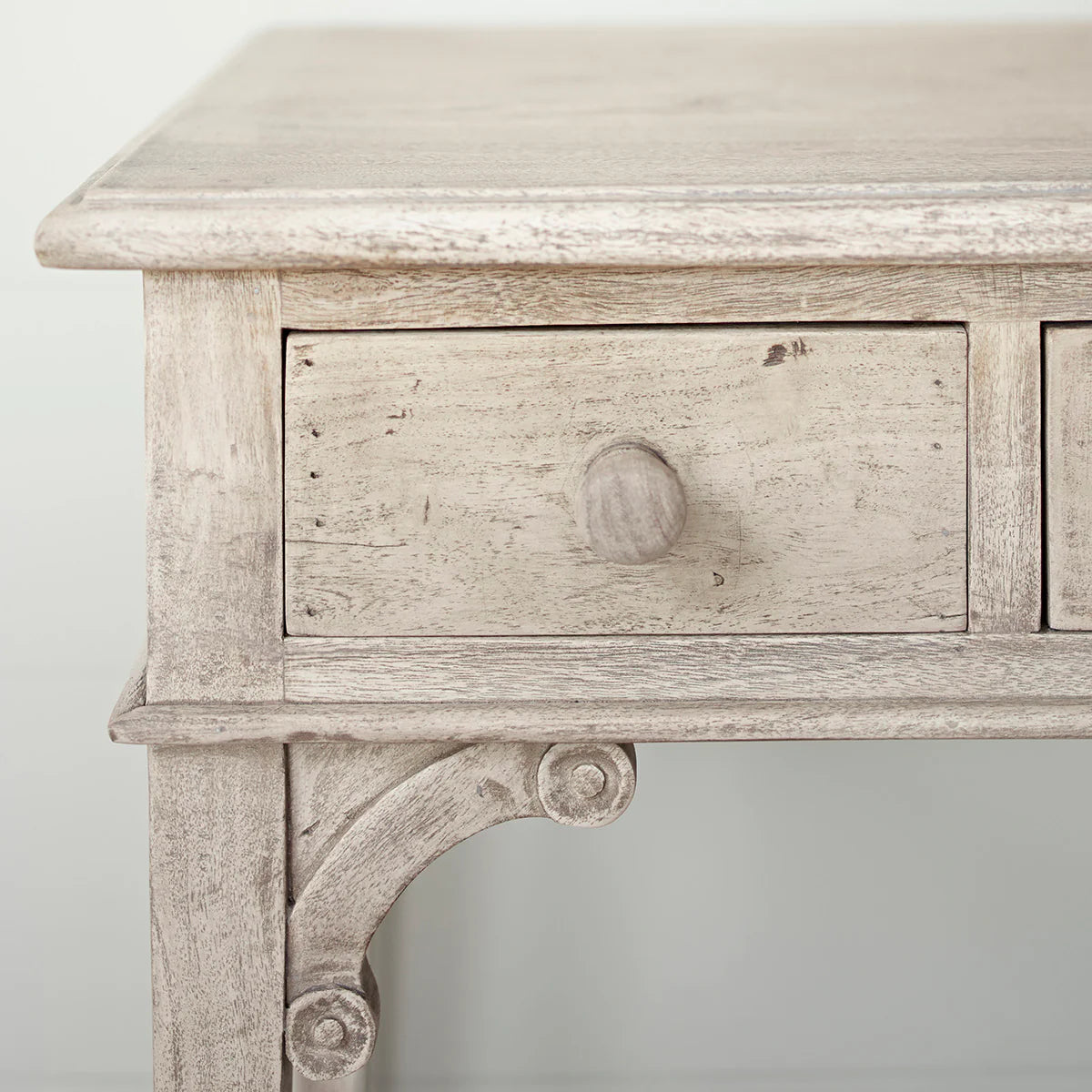 Close view of the drawer and carved detail of the Gustavian desk