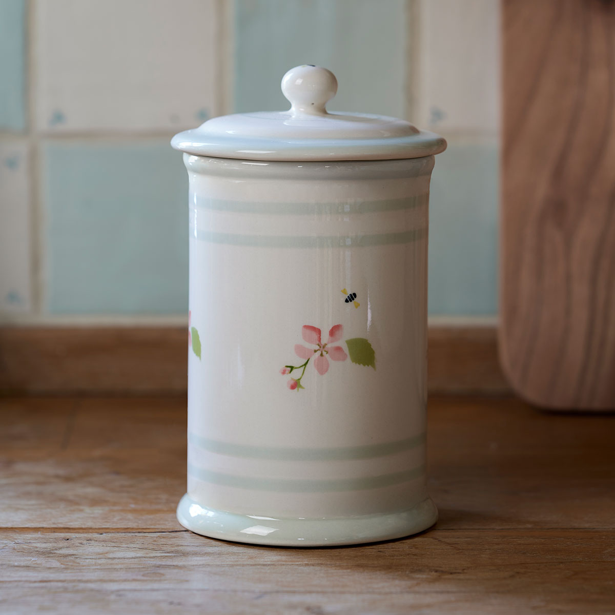 Apple Blossom storage jar, hand-decorated ceramic with a domed lid