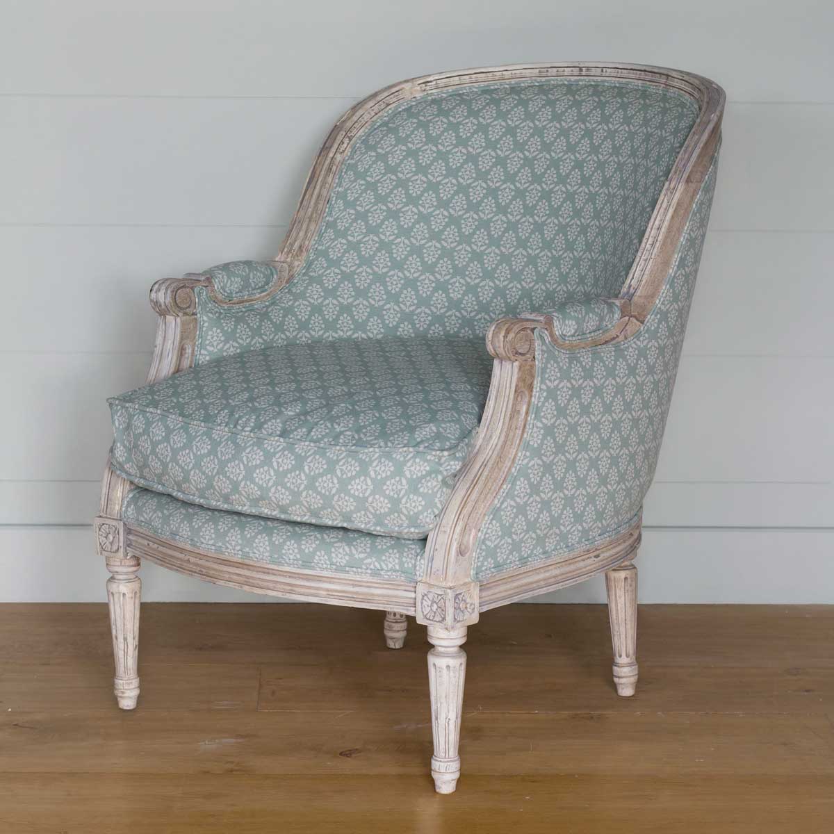 French armchair upholstered in duck egg sprig cotton with a limed frame