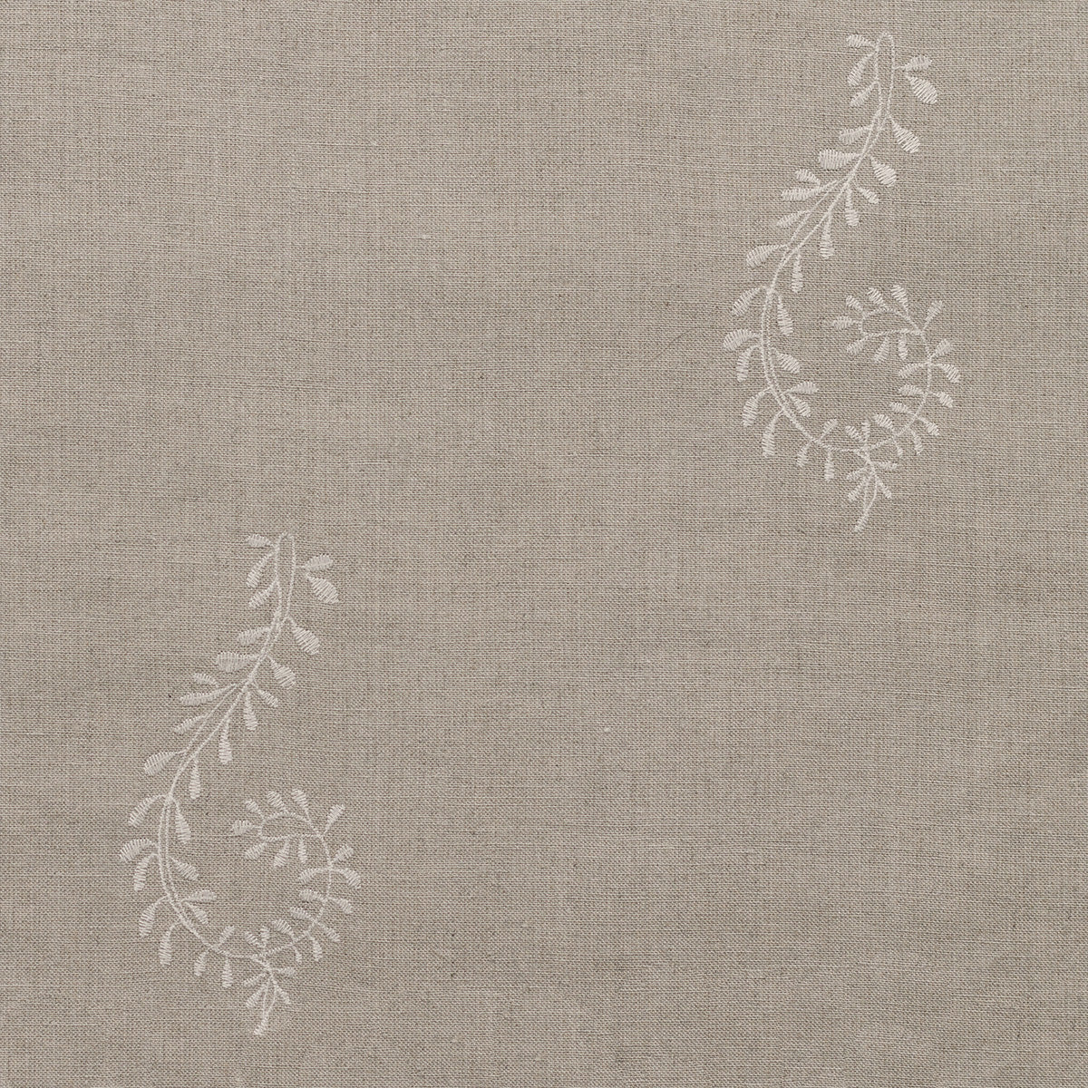 Ivory Shalini embroidered linen with a delicate trailing leaf design