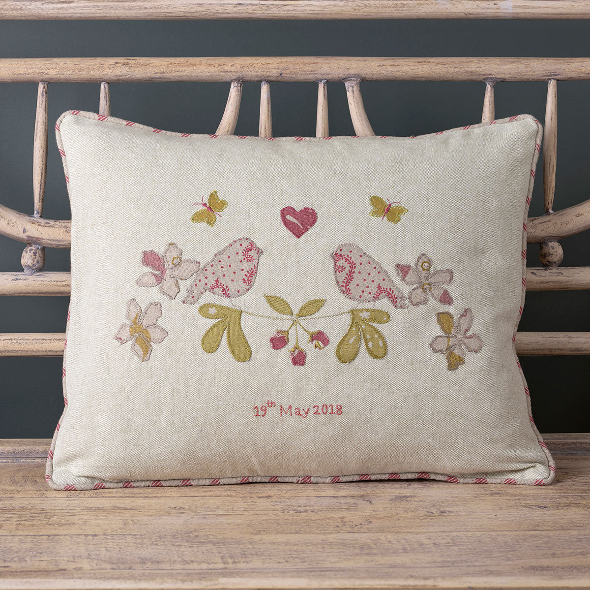 Lovebirds linen cushion embroidered with two birds and a personalised date