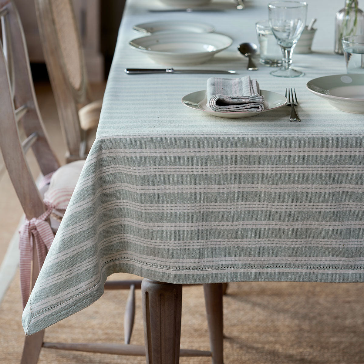 Duck Egg Cambridge Stripe thickweave tablecloth on a dining table laid for lunch