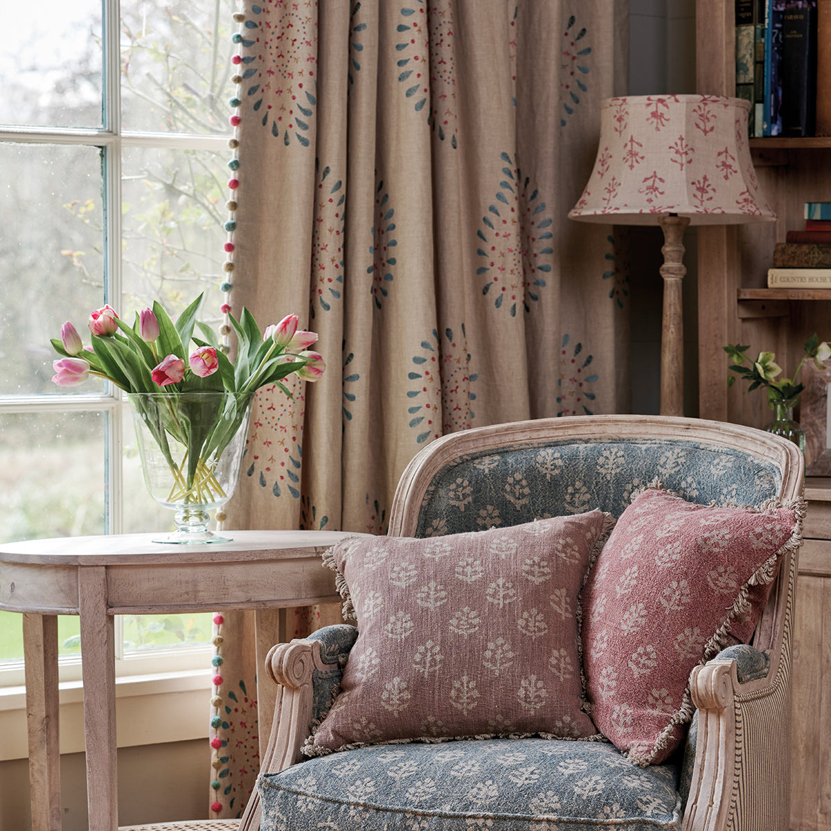 Room dressed with Malathi linen curtains, pleated lampshade and layered cushions