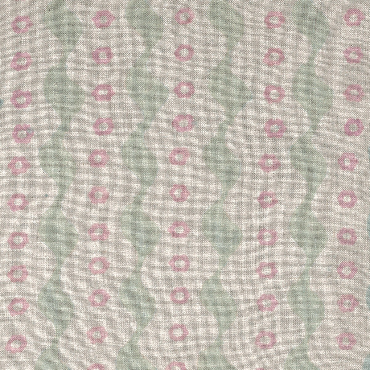 Bloomsbury linen hand-printed with wavy green stripes and small pink rings
