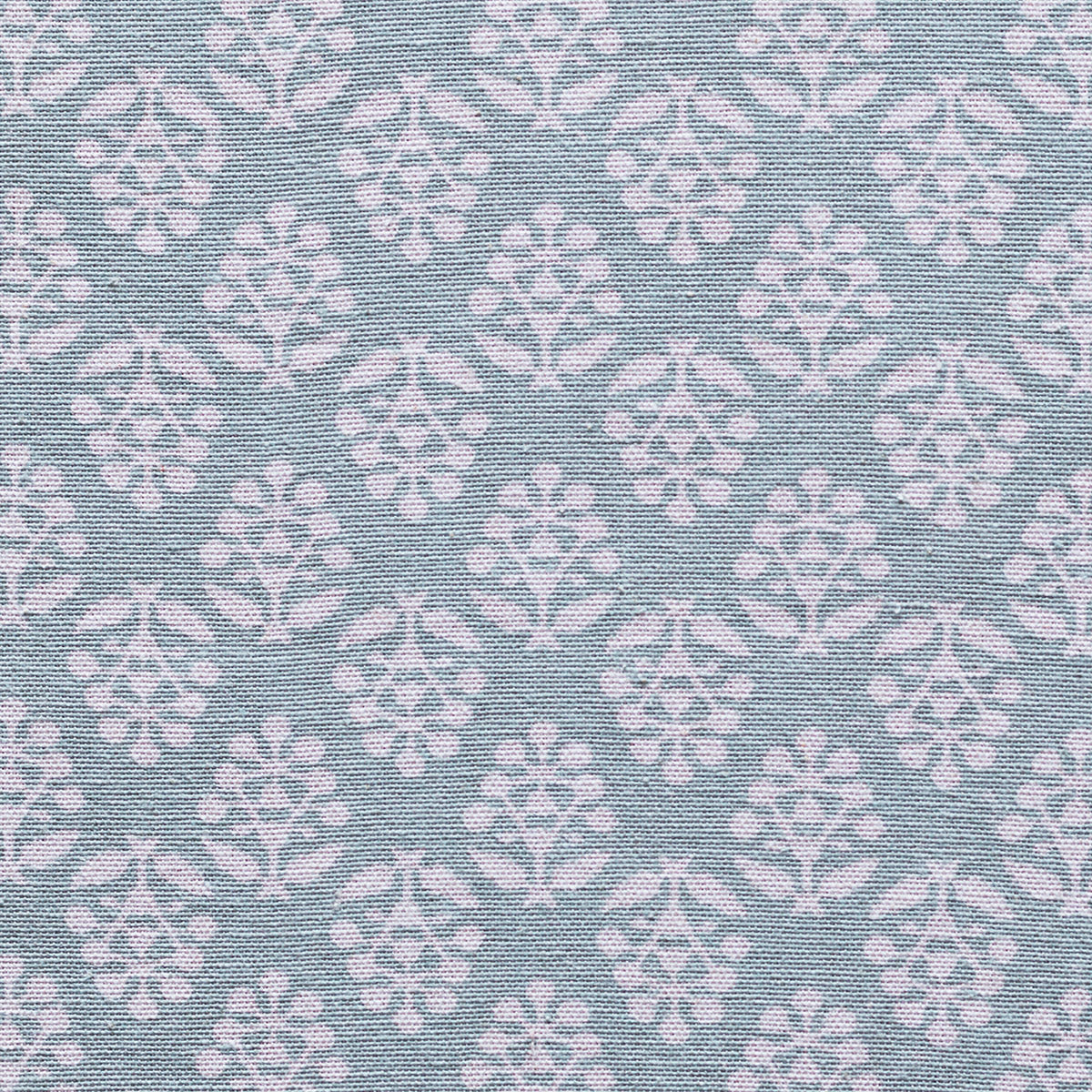 Duck egg sprig cotton laid flat, white floral repeat on soft blue