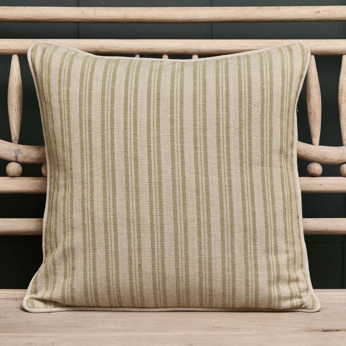 Leaf Green Ticking Stripe cotton cushion with piped edge on a bench