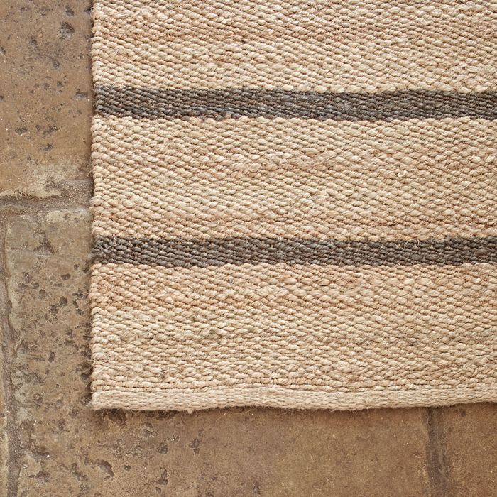 Close view of the charcoal striped hemp runner's woven texture