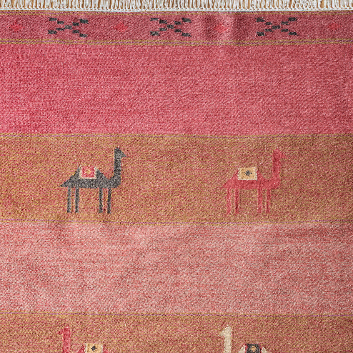 Camels and Stripes kilim close up, camels walking between pink stripes