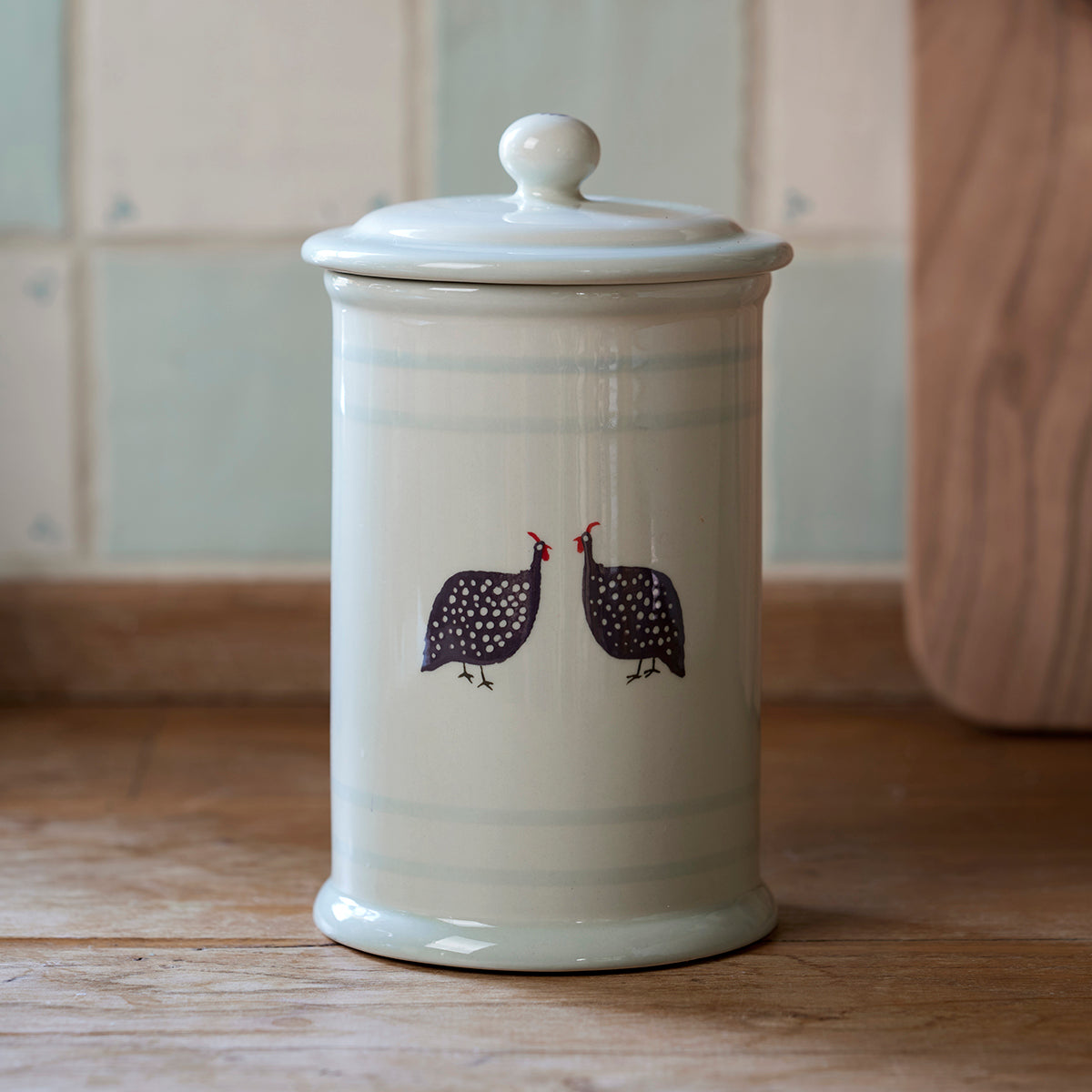 Cream Guinea Fowl storage jar with lid, hand-painted, plain background