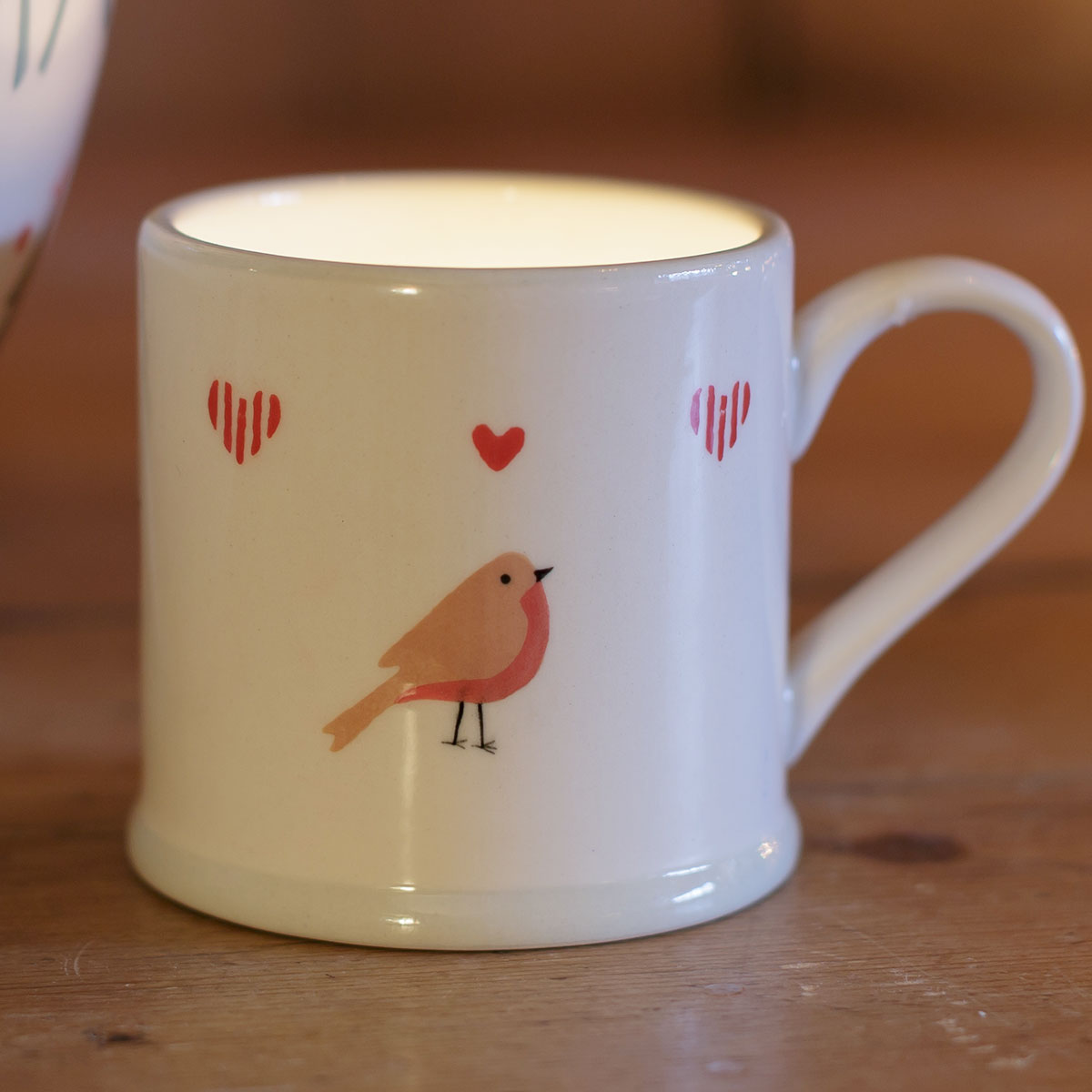 Single espresso mug candle hand-painted with a robin and hearts
