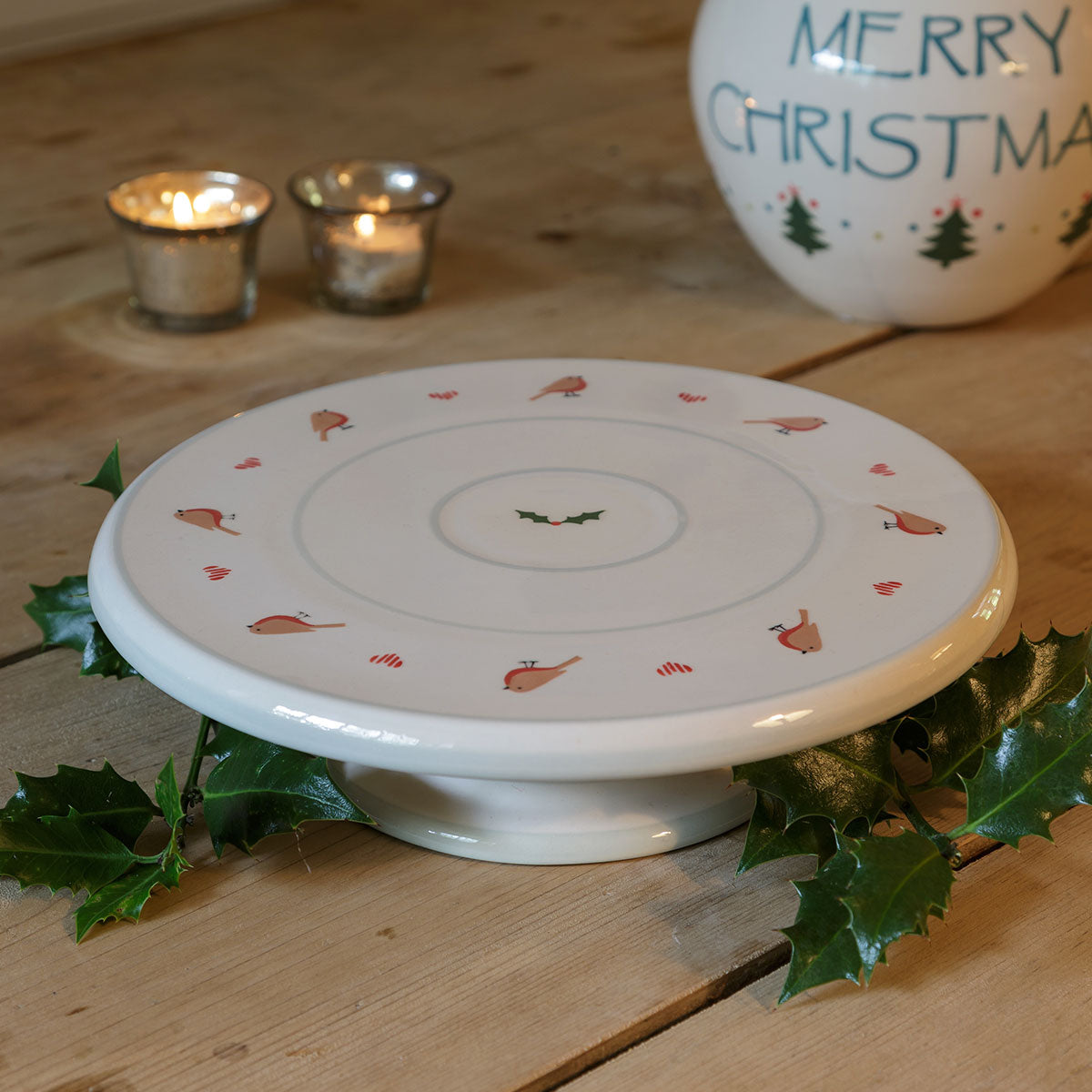 Christmas Robin cake stand with holly, tealights and a festive bowl