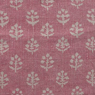 Pink stonewashed fabric printed all over with a delicate floral motif